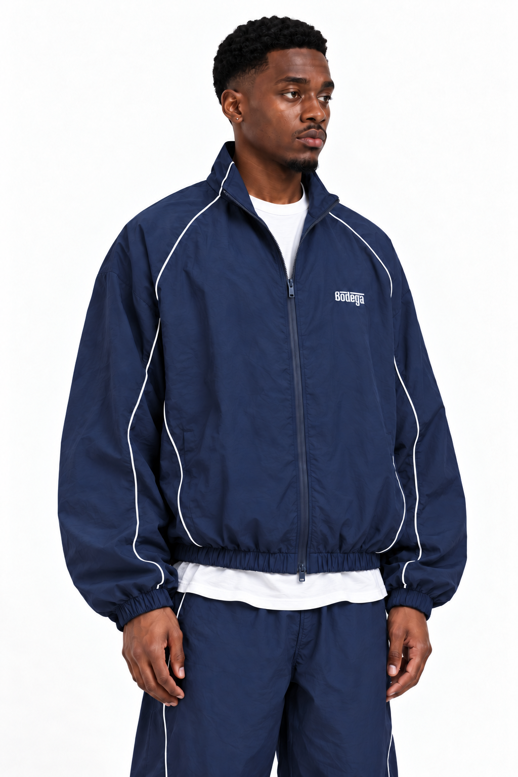 PIPED TRACK JACKET IN DEEP NAVY
