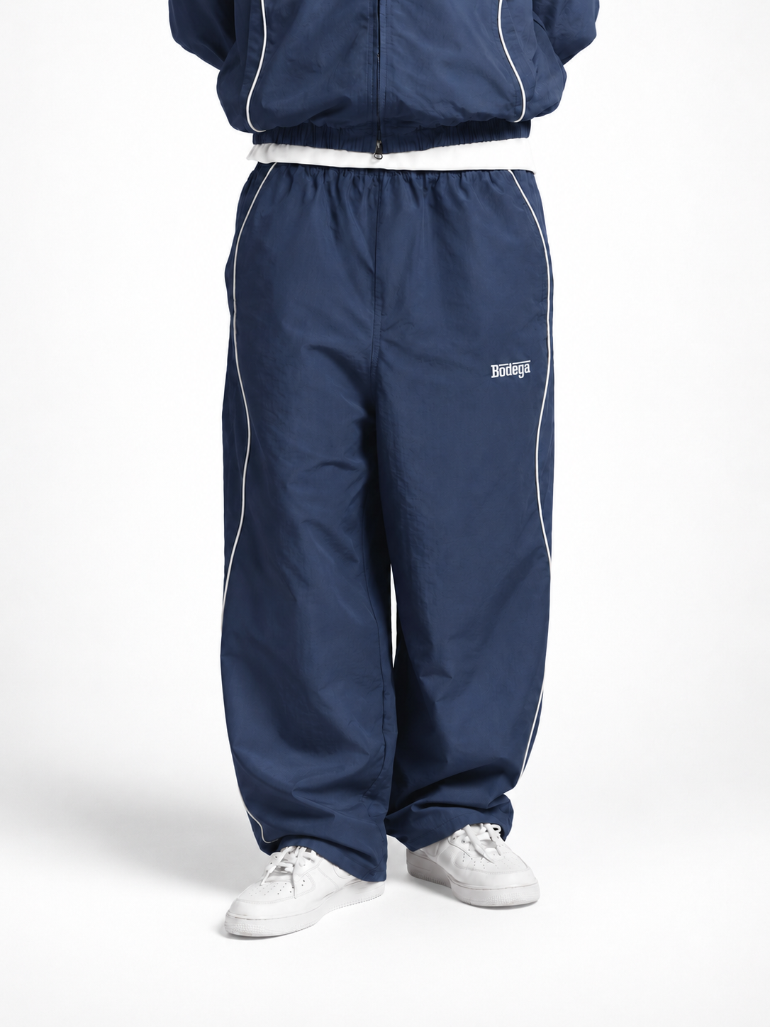 PIPED TRACK PANT IN DEEP NAVY
